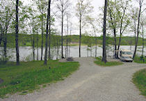 Spaces for RV and tent camping overlook the lake